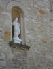 Entre-deux-Guiers, Statue du Sacré-Coeur sur la façade de la cure